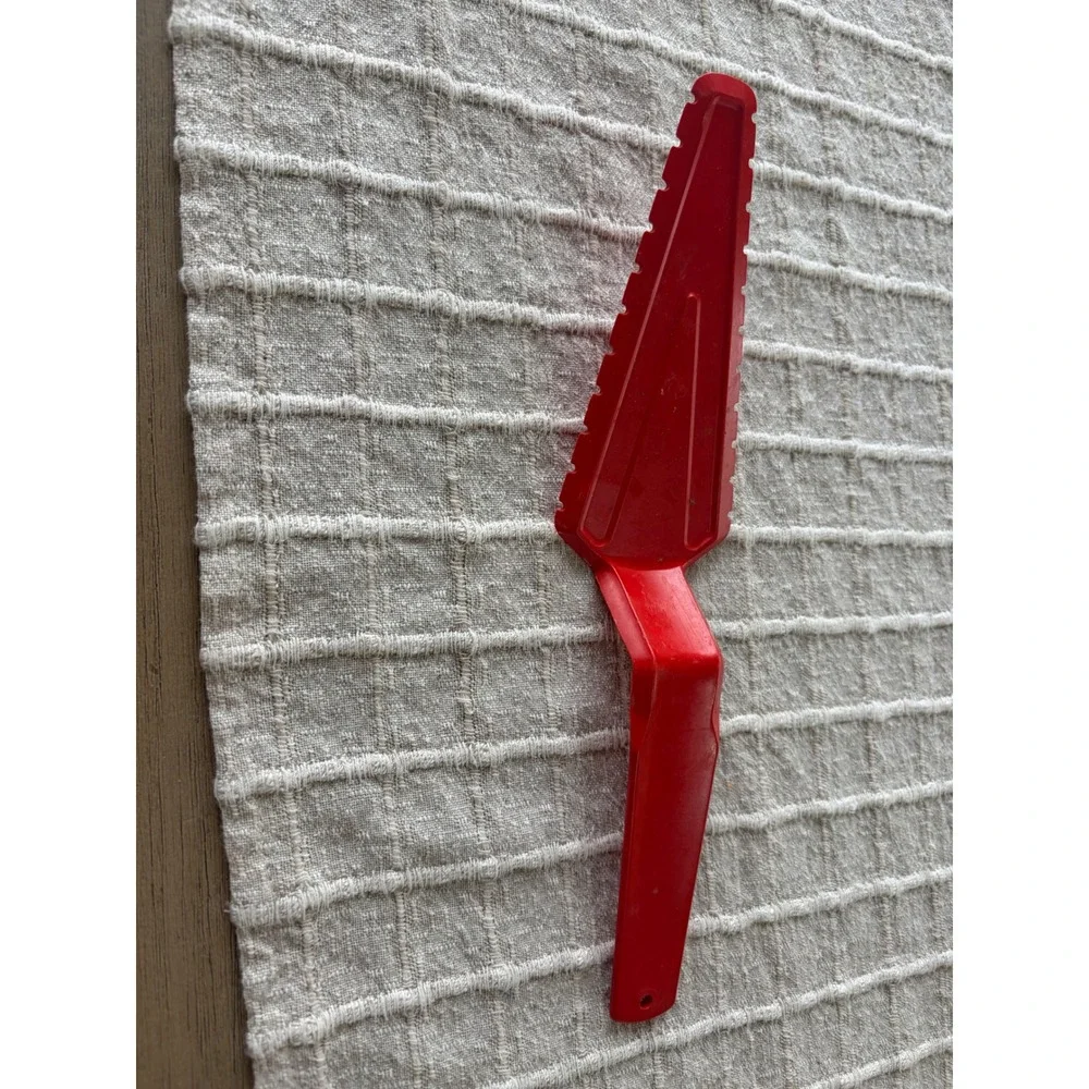 vintage red Tupperware cake and pie server, model 1228-7